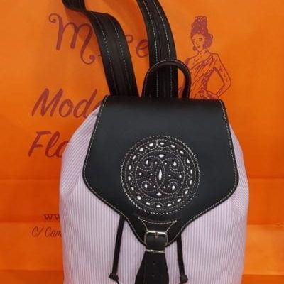 Mochila loneta y cuero rosa bebe mediana rosetón.